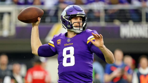 Kirk Cousins throws the football